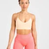 Essential V-ringad sport-BH med band