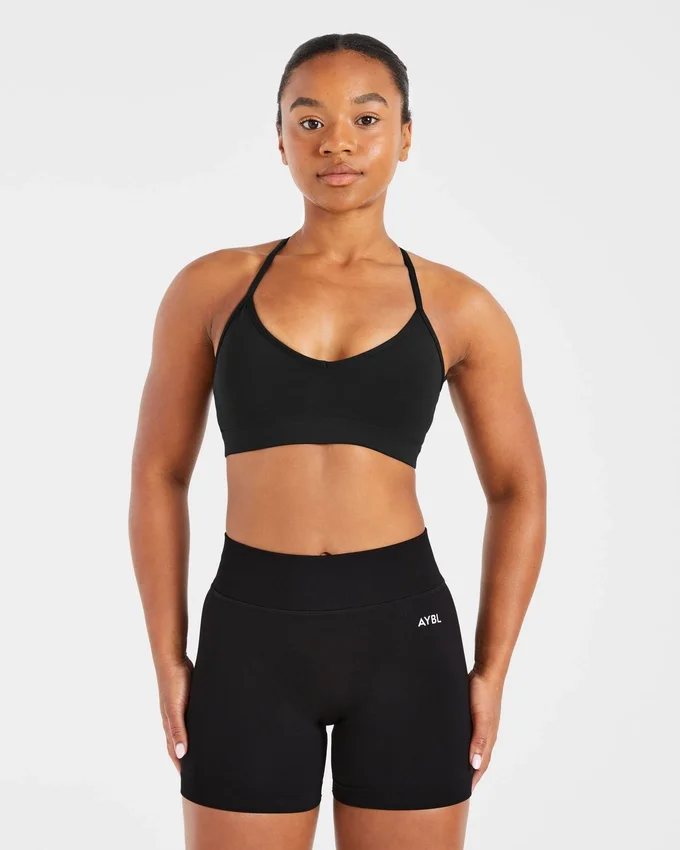 Essential V-ringad sport-BH med band