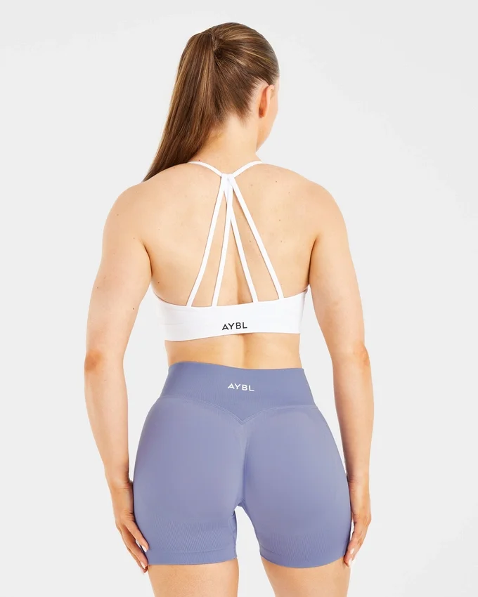 Essential V-ringad sport-BH med band