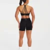 Essential V-ringad sport-BH med band