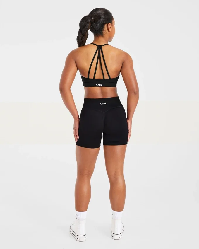 Essential V-ringad sport-BH med band