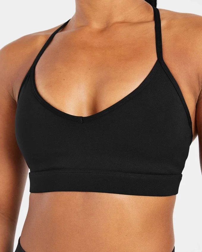 Essential V-ringad sport-BH med band