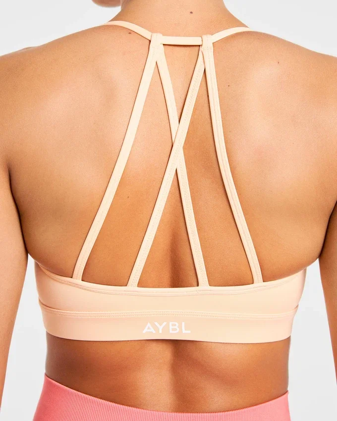 Essential V-ringad sport-BH med band
