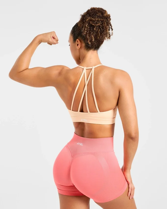 Essential V-ringad sport-BH med band