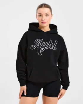 Oversized-hoodie med broderad text