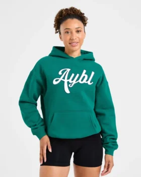 Oversized-hoodie med broderad text