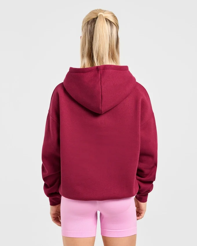 Oversized-hoodie med broderad text