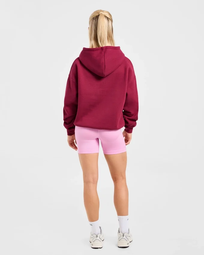 Oversized-hoodie med broderad text