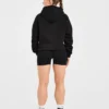 Oversized-hoodie med broderad text