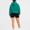 Oversized-hoodie med broderad text