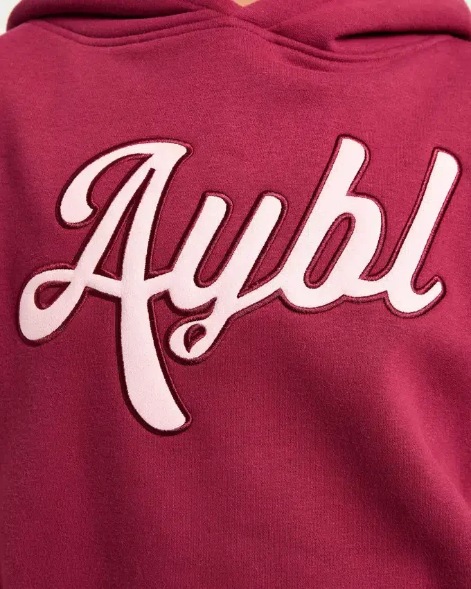 Oversized-hoodie med broderad text