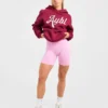 Oversized-hoodie med broderad text