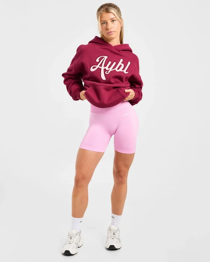 Oversized-hoodie med broderad text
