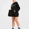 Oversized-hoodie med broderad text