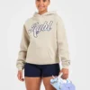 Oversized-hoodie med broderad text