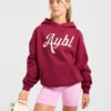 Oversized-hoodie med broderad text