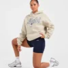Oversized-hoodie med broderad text