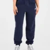 Retro-broderade mjukisbyxor i oversized-modell