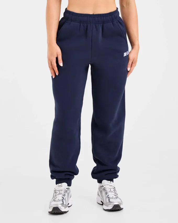 Retro-broderade mjukisbyxor i oversized-modell