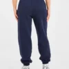 Retro-broderade mjukisbyxor i oversized-modell