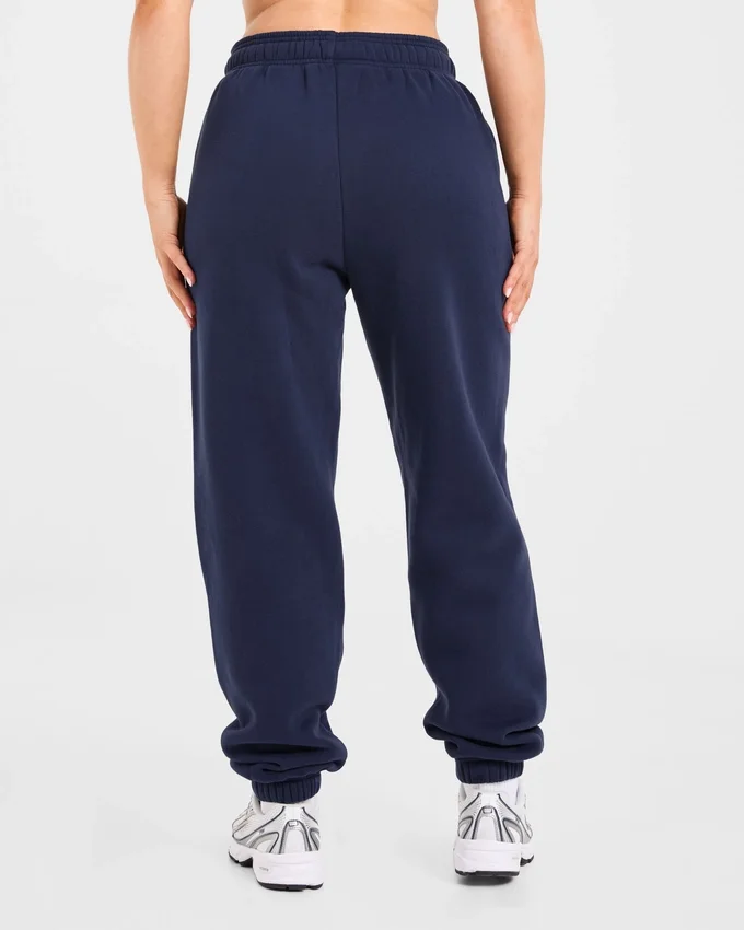 Retro-broderade mjukisbyxor i oversized-modell