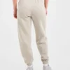 Retro-broderade mjukisbyxor i oversized-modell