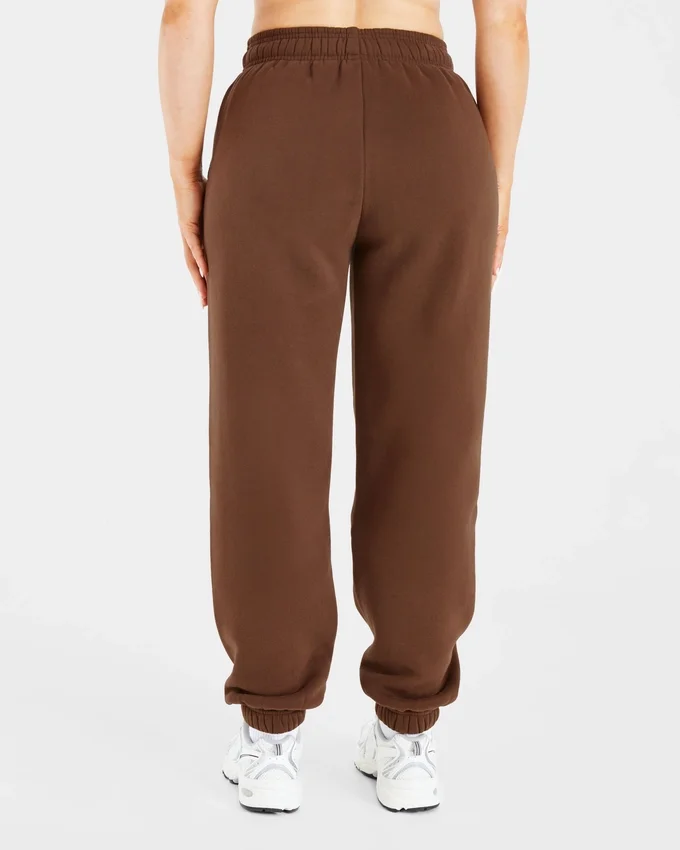 Retro-broderade mjukisbyxor i oversized-modell