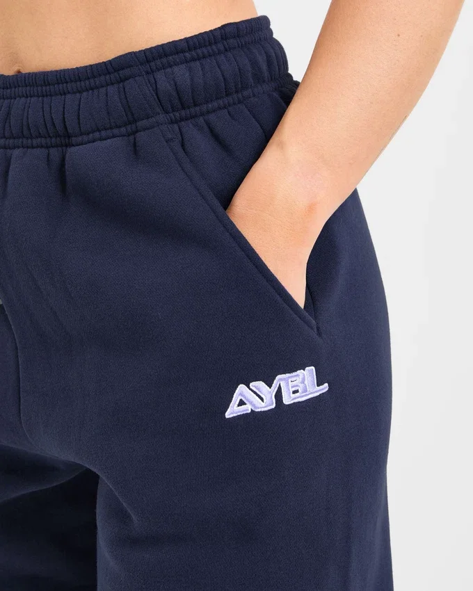Retro-broderade mjukisbyxor i oversized-modell