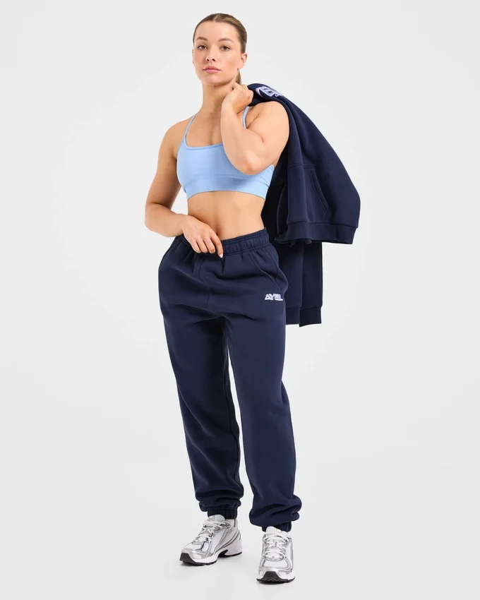 Retro-broderade mjukisbyxor i oversized-modell