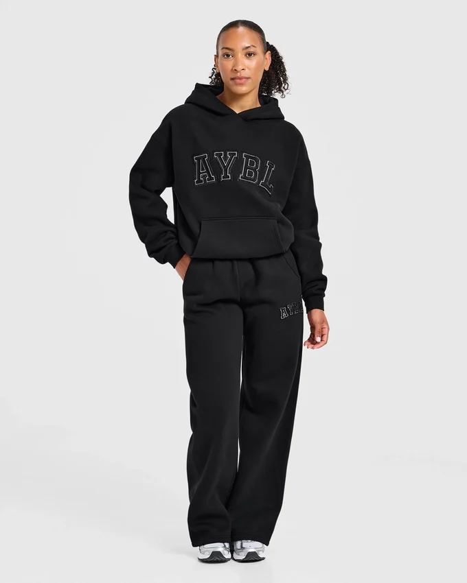 Varsity-hoodie med applikation i oversized-passform