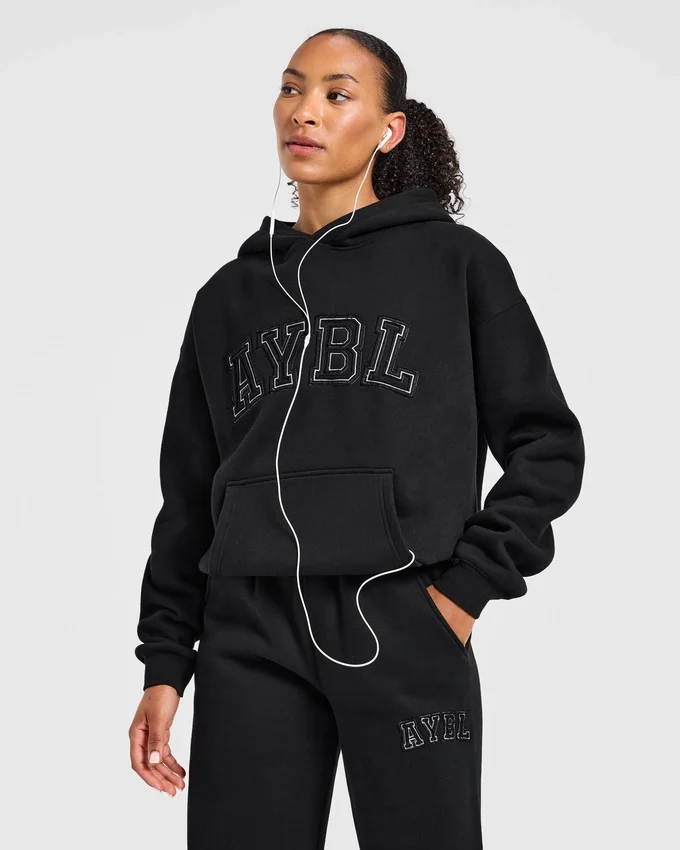 Varsity-hoodie med applikation i oversized-passform