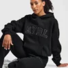 Varsity-hoodie med applikation i oversized-passform