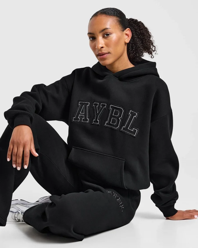 Varsity-hoodie med applikation i oversized-passform