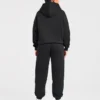 Varsity-mjukisbyxor i oversized-modell med applikation