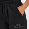 Varsity-mjukisbyxor med applikation och raka ben i oversized-modell