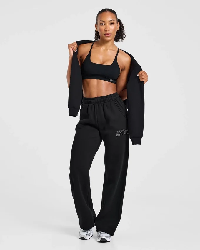 Varsity-mjukisbyxor med applikation och raka ben i oversized-modell