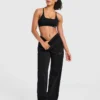 Varsity-mjukisbyxor med applikation och raka ben i oversized-modell