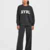 Varsity Oversized stickade mjukisbyxor