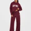 Varsity Oversized stickade mjukisbyxor