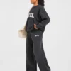 Varsity Oversized stickade mjukisbyxor